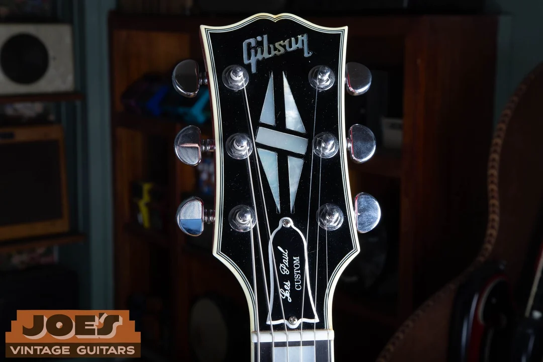 2000 Gibson Les Paul Custom headstock with modern dotted Gibson logo