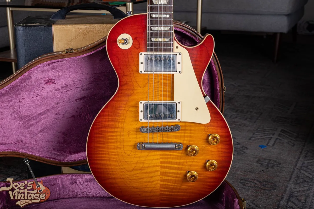 2022 Gibson R9 reissue with a figured sunburst maple top and two covered humbuckers; not a vintage 1959 Les Paul