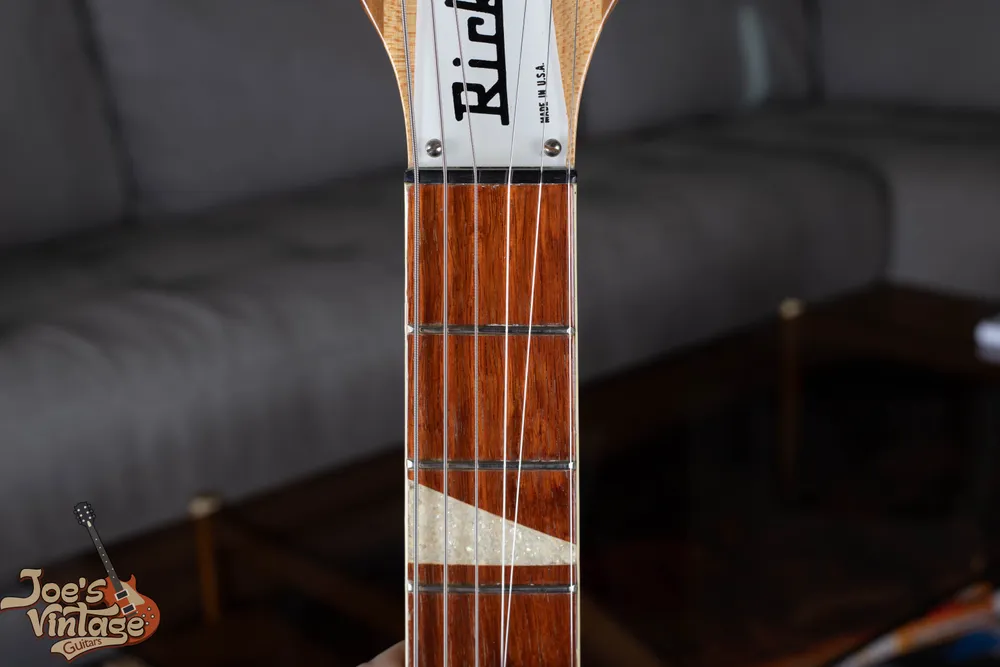 Triangular inlay extending across the fingerboard of a vintage Rickenbacker 360