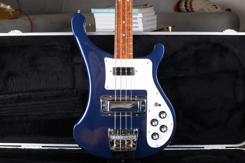 Black Hi-Gain neck pickup with four visible polepieces on a blue Rickenbacker bass