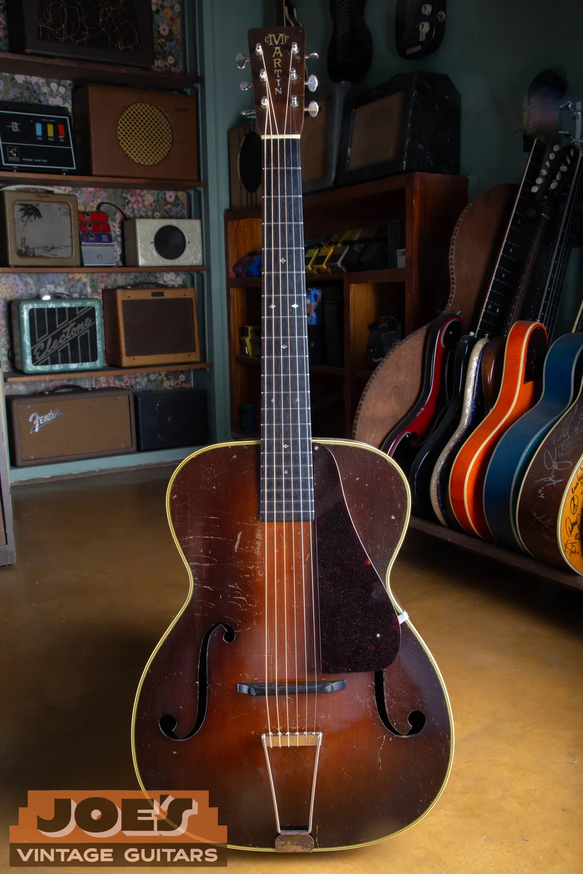 Full front of a sunburst 1934 Martin C-2 archtop
