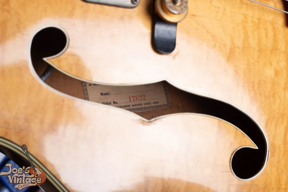 Rectangular Gretsch label with serial 17622 inside a natural Country Club