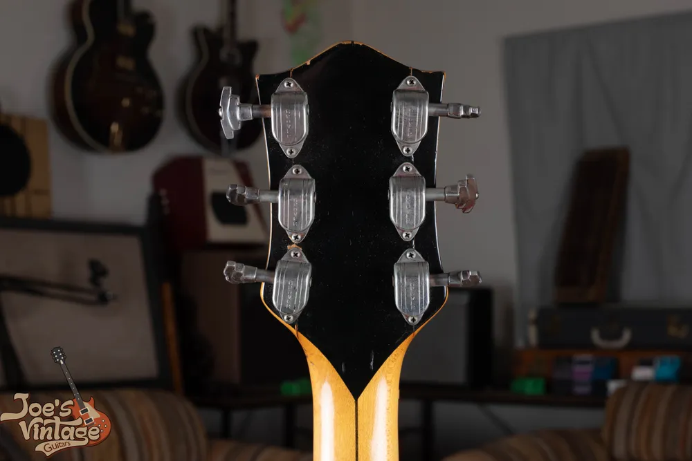 Grover tuner housings on a natural Country Club headstock