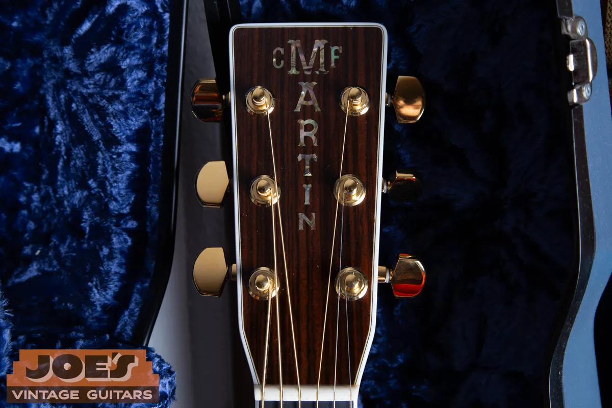 Pearl headstock lettering and gold tuners on a 2005 Martin D-45