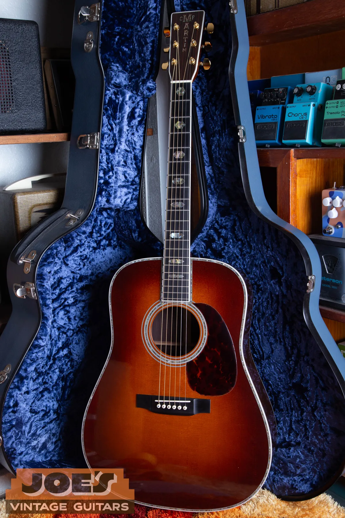 Full front of a sunburst 2005 Martin D-45 with pearl trim