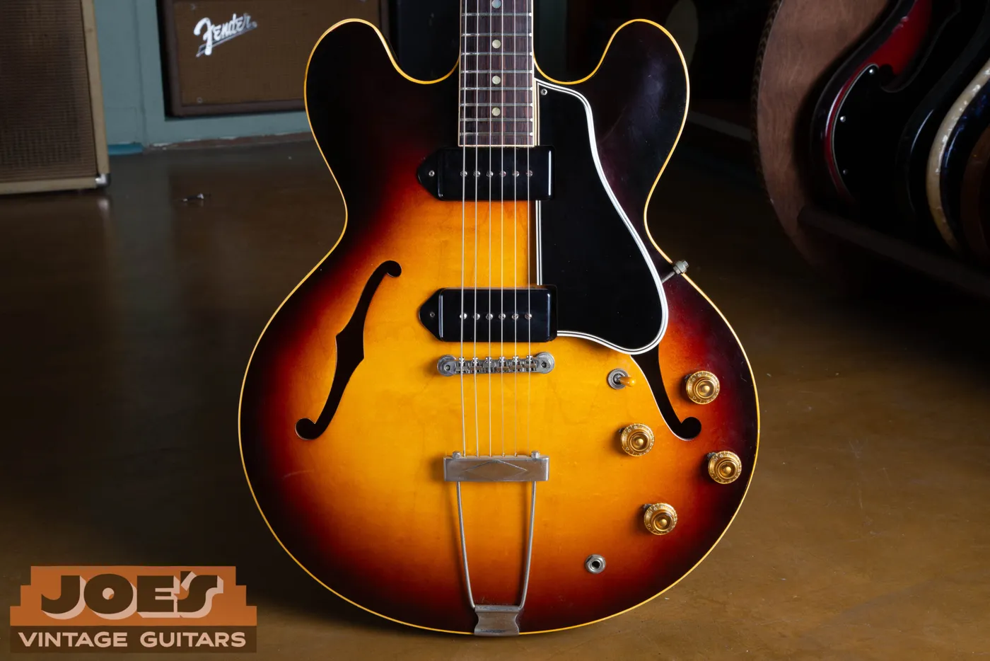 Sunburst 1959 ES-330 body with black dogear pickups and a trapeze tailpiece