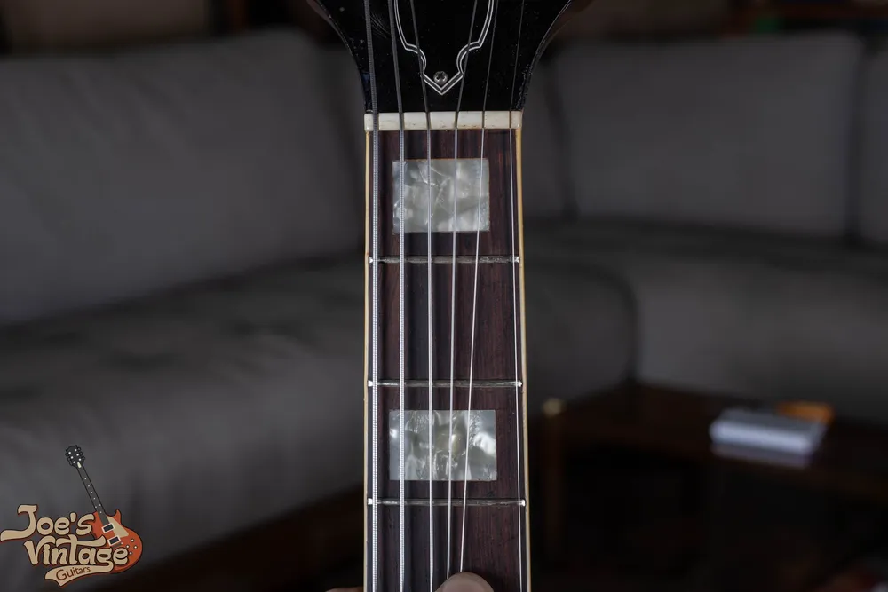 Block fingerboard inlays on an early Guild X175