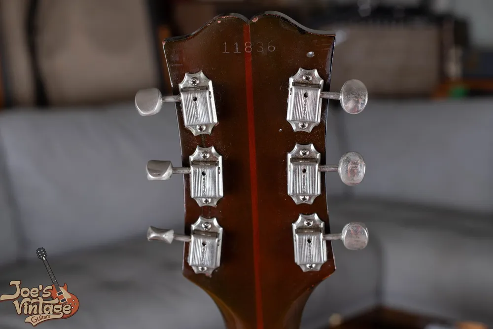 Early Guild X175 headstock showing serial 11830 and tuner backs