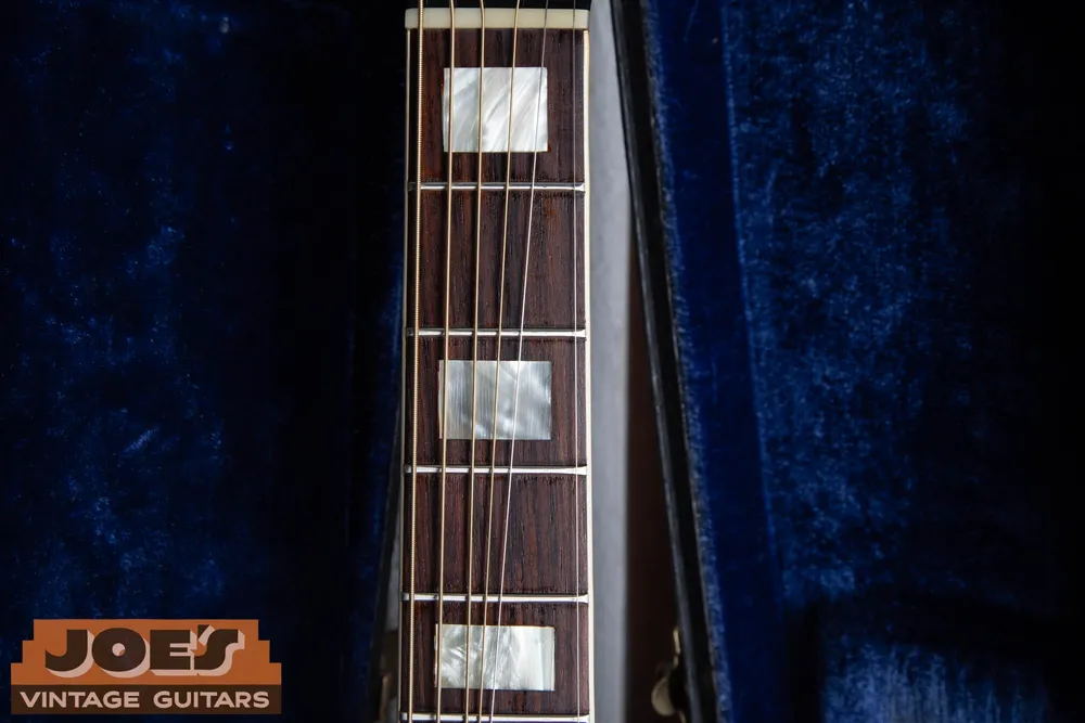 Rectangular fingerboard inlays on a Guild F48