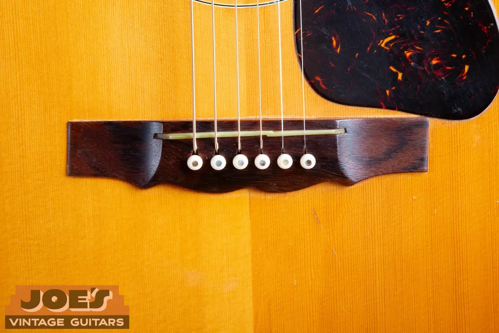 Bridge and saddle on a Guild F50 acoustic