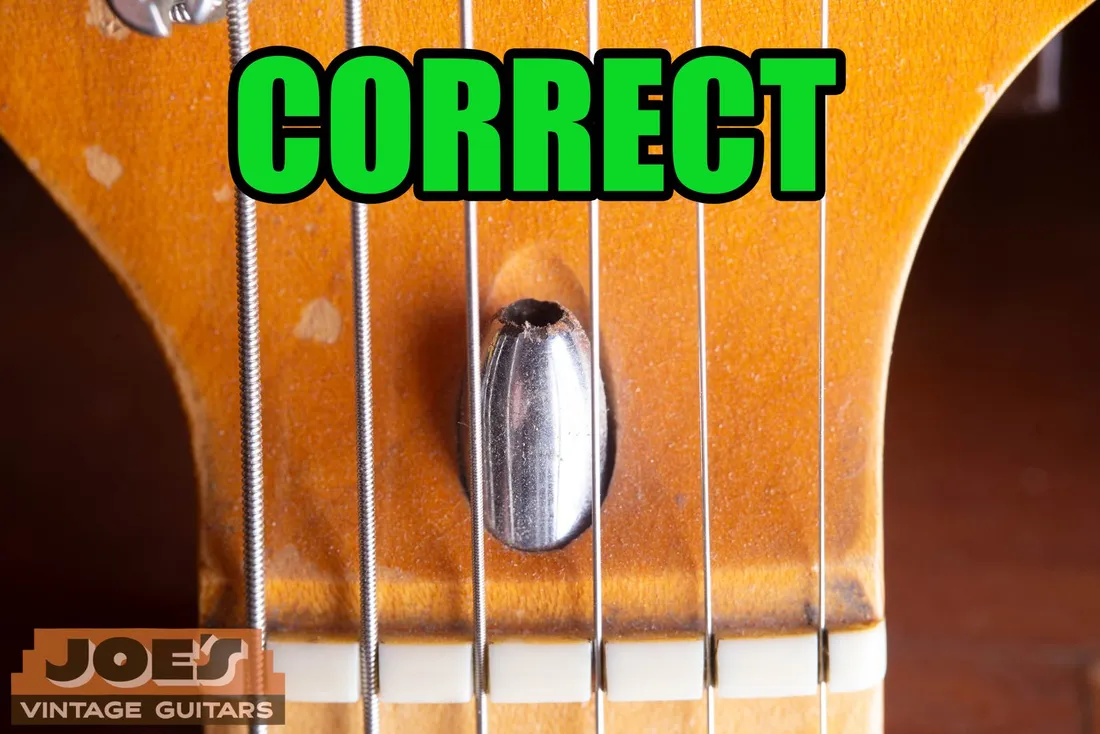 Bullet-style truss rod nut on a Fender headstock