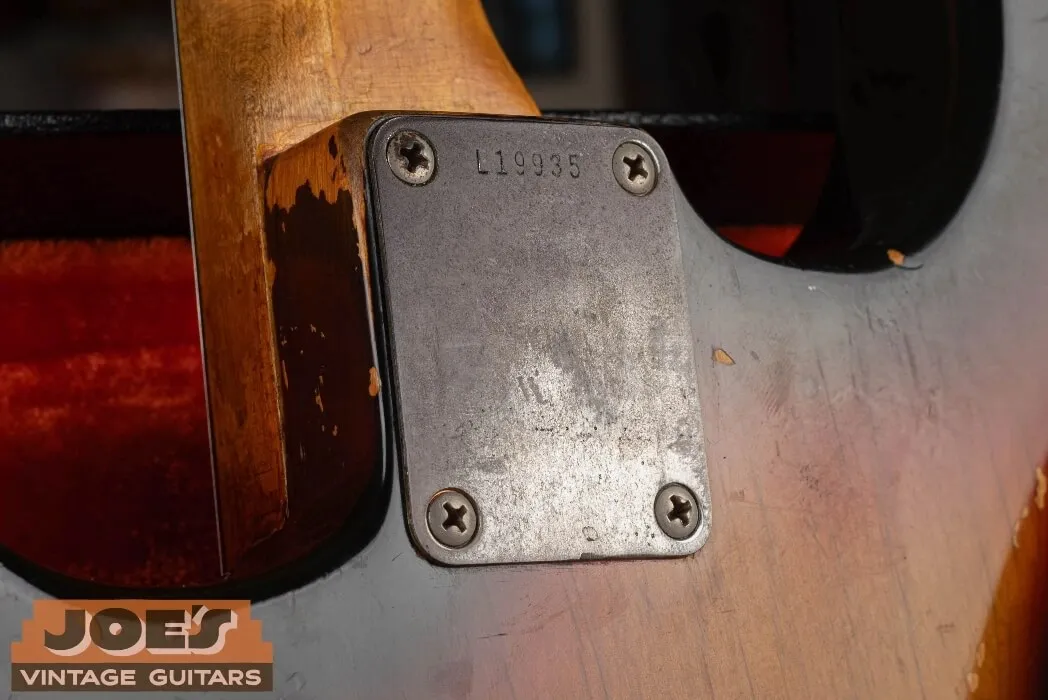 An L-series Fender neck plate serial number from 1963 to 1965