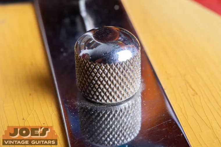 Close view of a coarse-knurled round-top control knob on a 1952 Fender Telecaster
