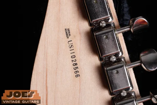 Fender US-prefix serial number on back of headstock: US indicates 2010s and later production, first two digits after US give the specific year