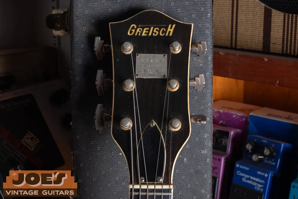 Country Gentleman metal nameplate on the front of a Gretsch headstock