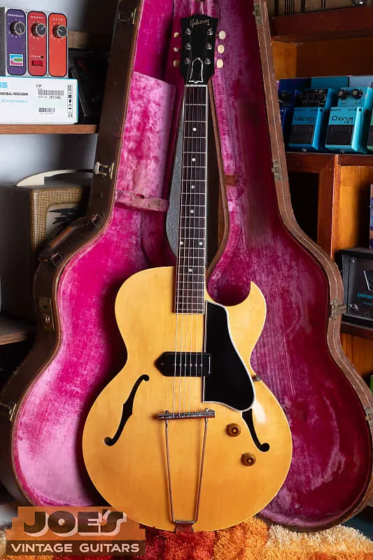 Full front of a natural finish 1958 Gibson ES-225TN with one center P-90