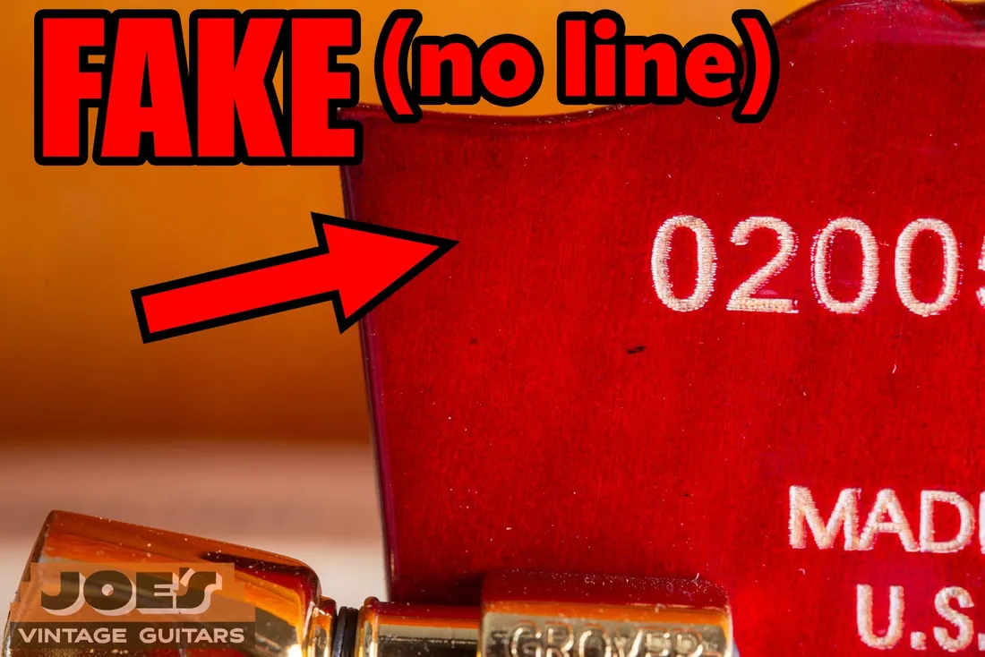No headstock seam visible on the back of a counterfeit Gibson-style guitar