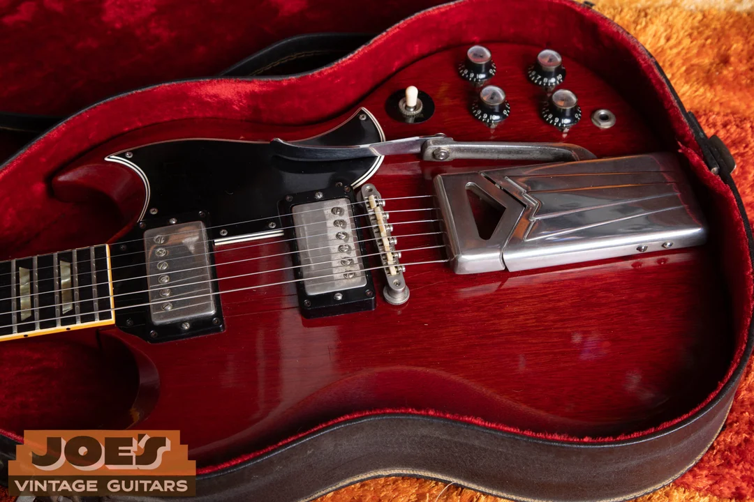 Nickel ABR-1, separate humbucker rings, small pickguard and black reflector knobs on a 1962 SG Standard