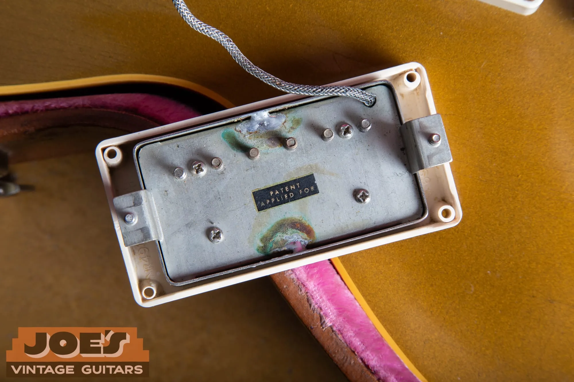 PAF humbucker baseplate with PATENT APPLIED FOR sticker and oxidized cover solder