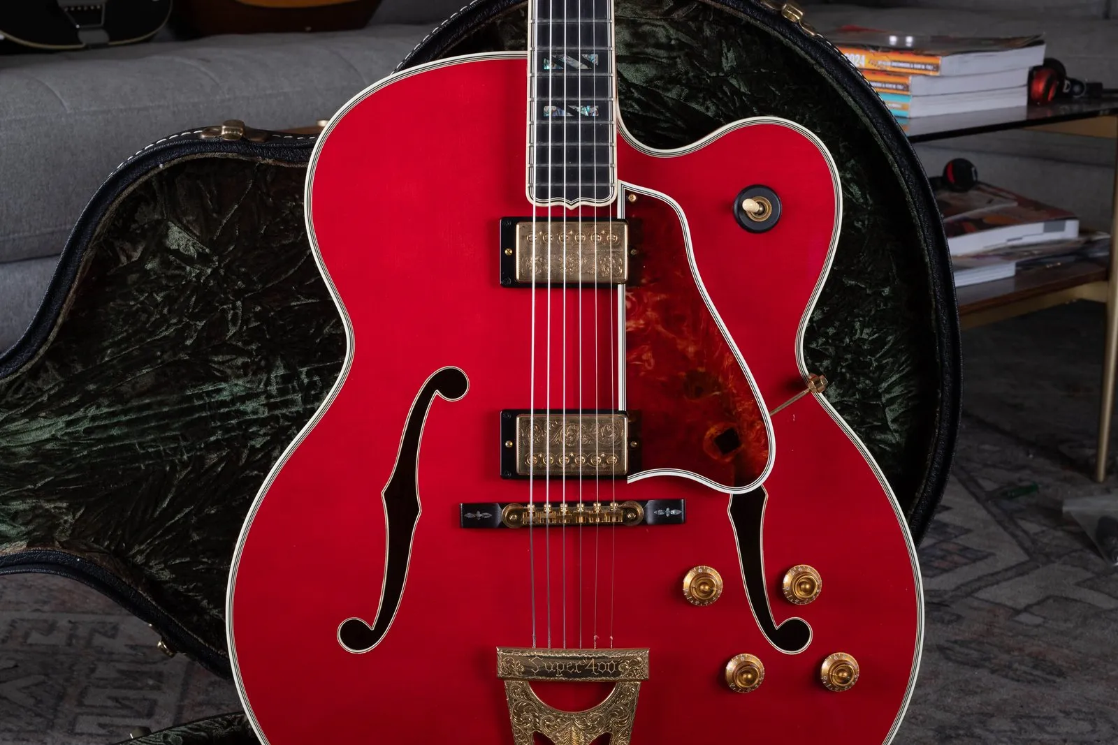 A 2010s custom-ordered Gibson Super 400 thinline from Gibson Custom Shop, with engraved pickups, in a green-lined case.