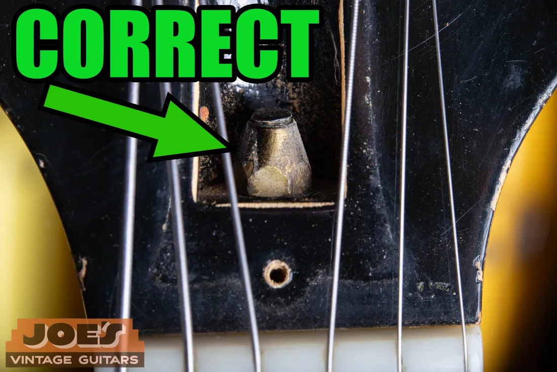 Brass truss rod nut on an authentic vintage Gibson guitar