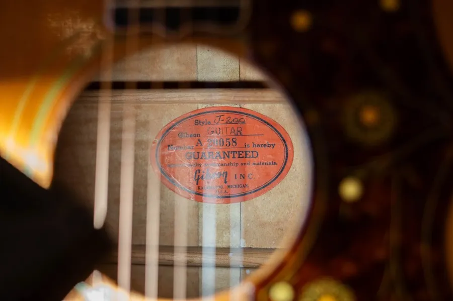 Orange Gibson label inside the 1957 J-200
