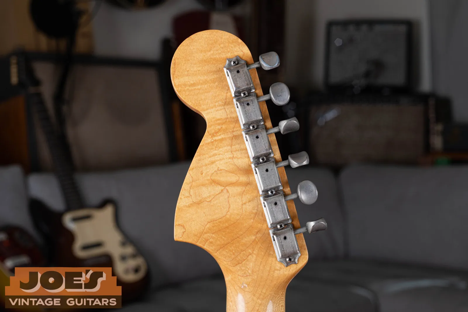 Double-line Kluson Deluxe tuners on a Fender Jazzmaster, KLUSON on the first line and DELUXE on the second