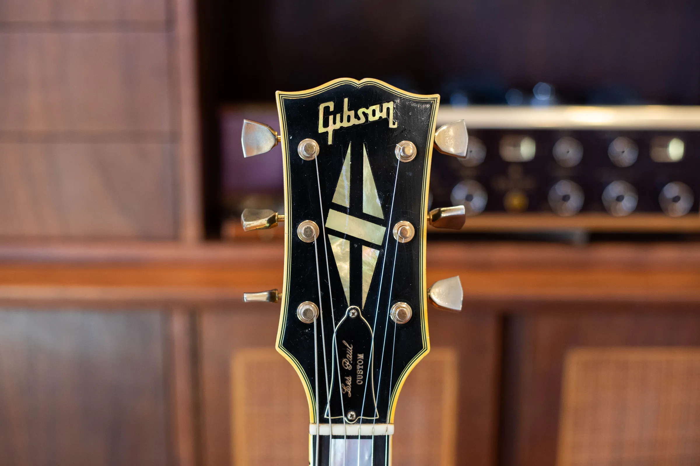 Front of a 1970 Les Paul Custom headstock with dotless Gibson logo and split-diamond inlay