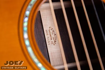 Authentic Martin back center strip stamped C.F. Martin &amp; Co. Nazareth, PA., seen through the soundhole
