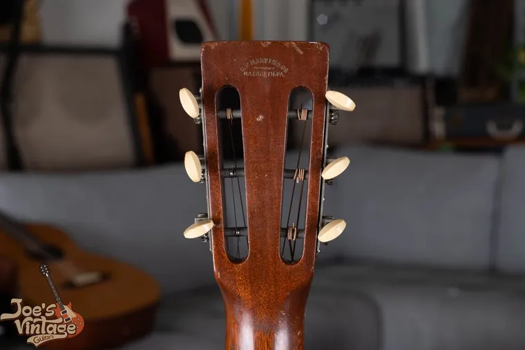 Vintage Martin headstock stamp and tuner detail