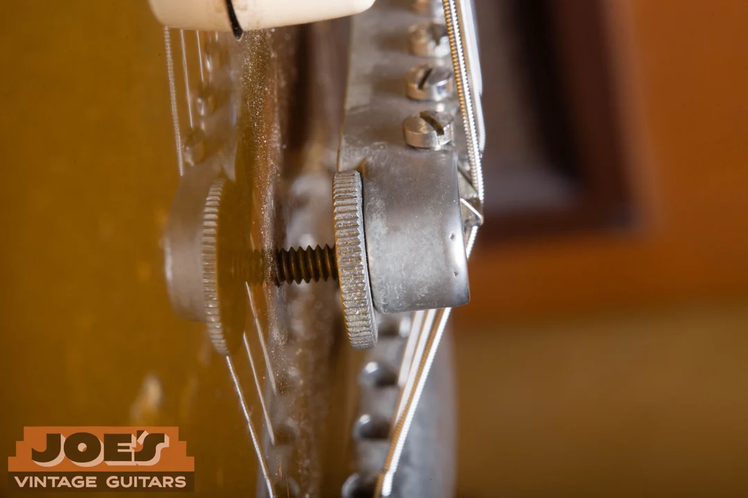 Side view of a nickel no-wire Gibson ABR-1 Tune-O-Matic bridge