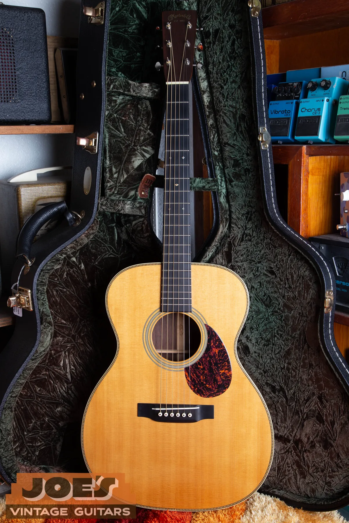 Full front of a 2005 Martin OM-28V shown as a modern comparison