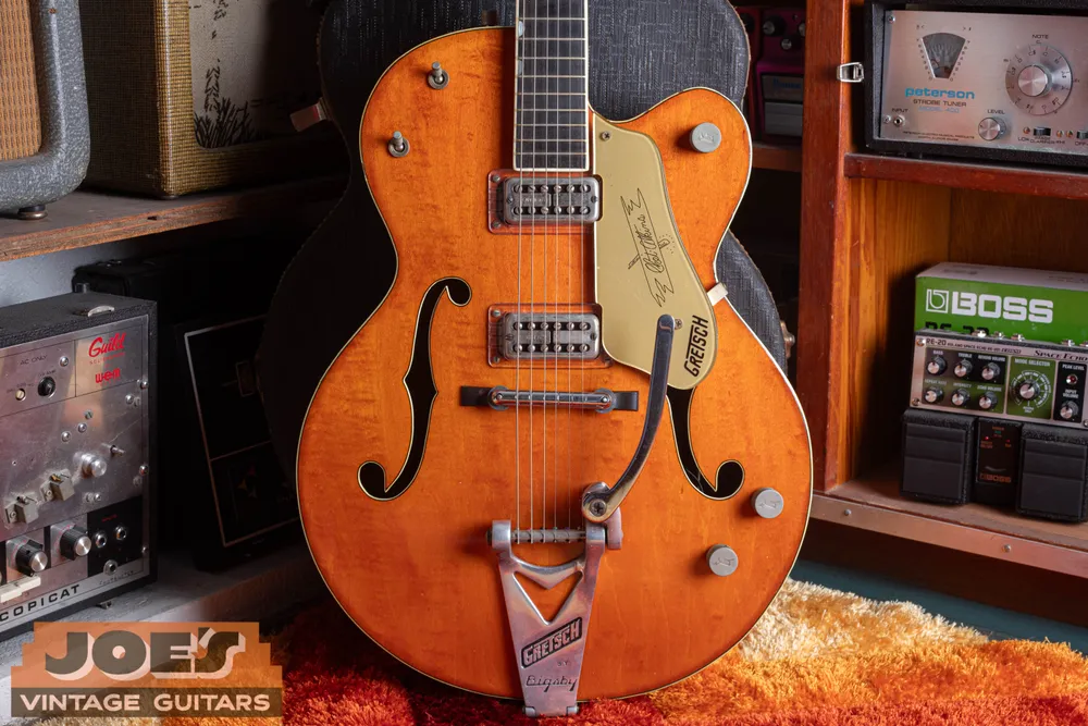Orange-stained single-cutaway Gretsch 6120
