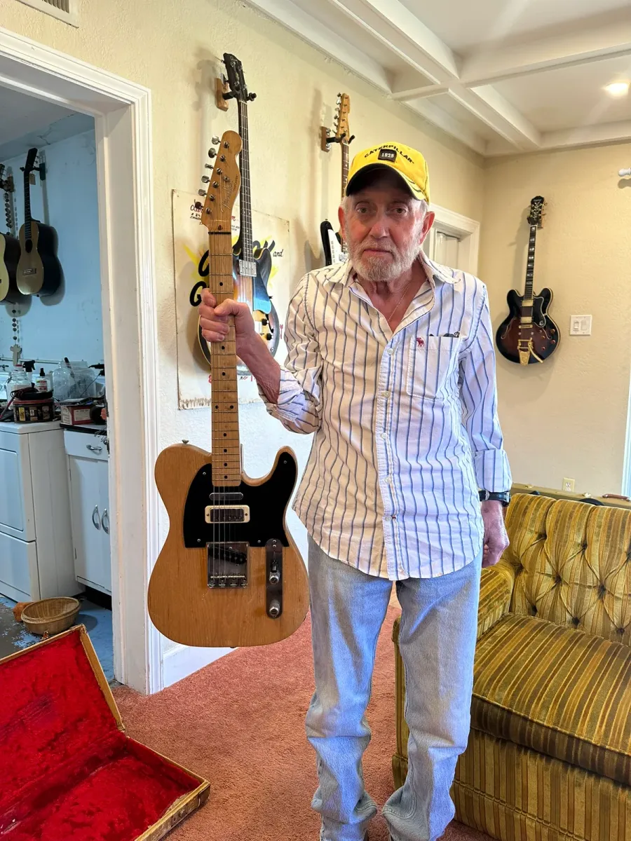 Phoenix seller holding a modified 1956 Fender Telecaster with original pickups and electronics