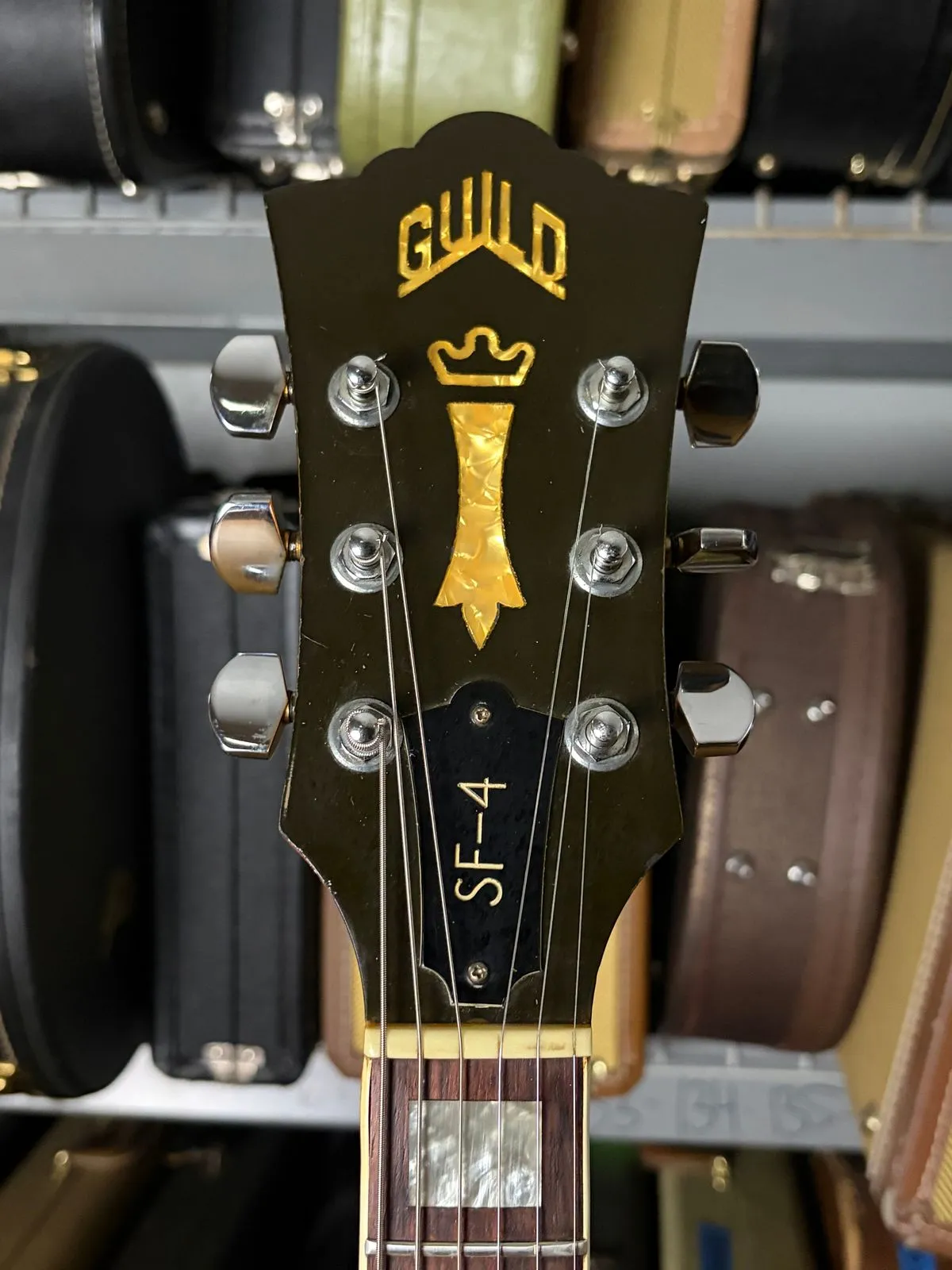 1977 Guild Starfire IV showing headstock with SF-4 marking