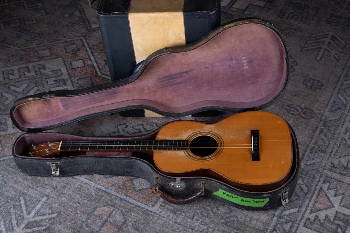 Four-string 1927 Martin 5-21 tenor guitar in an open case
