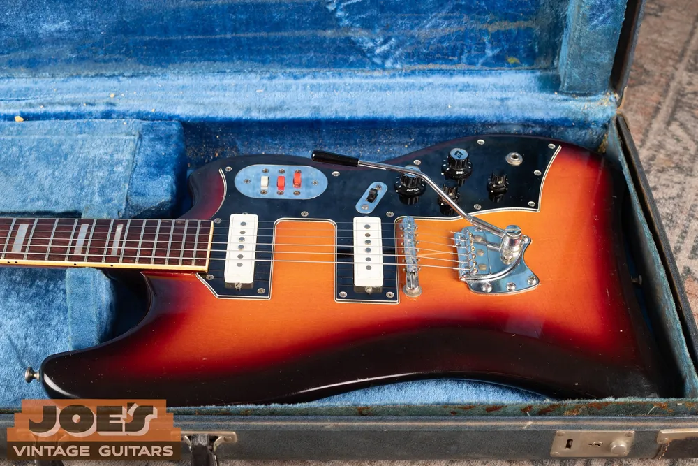 Guild Thunderbird with narrow white single coils, Hagstrom vibrato and Guild-logo knobs