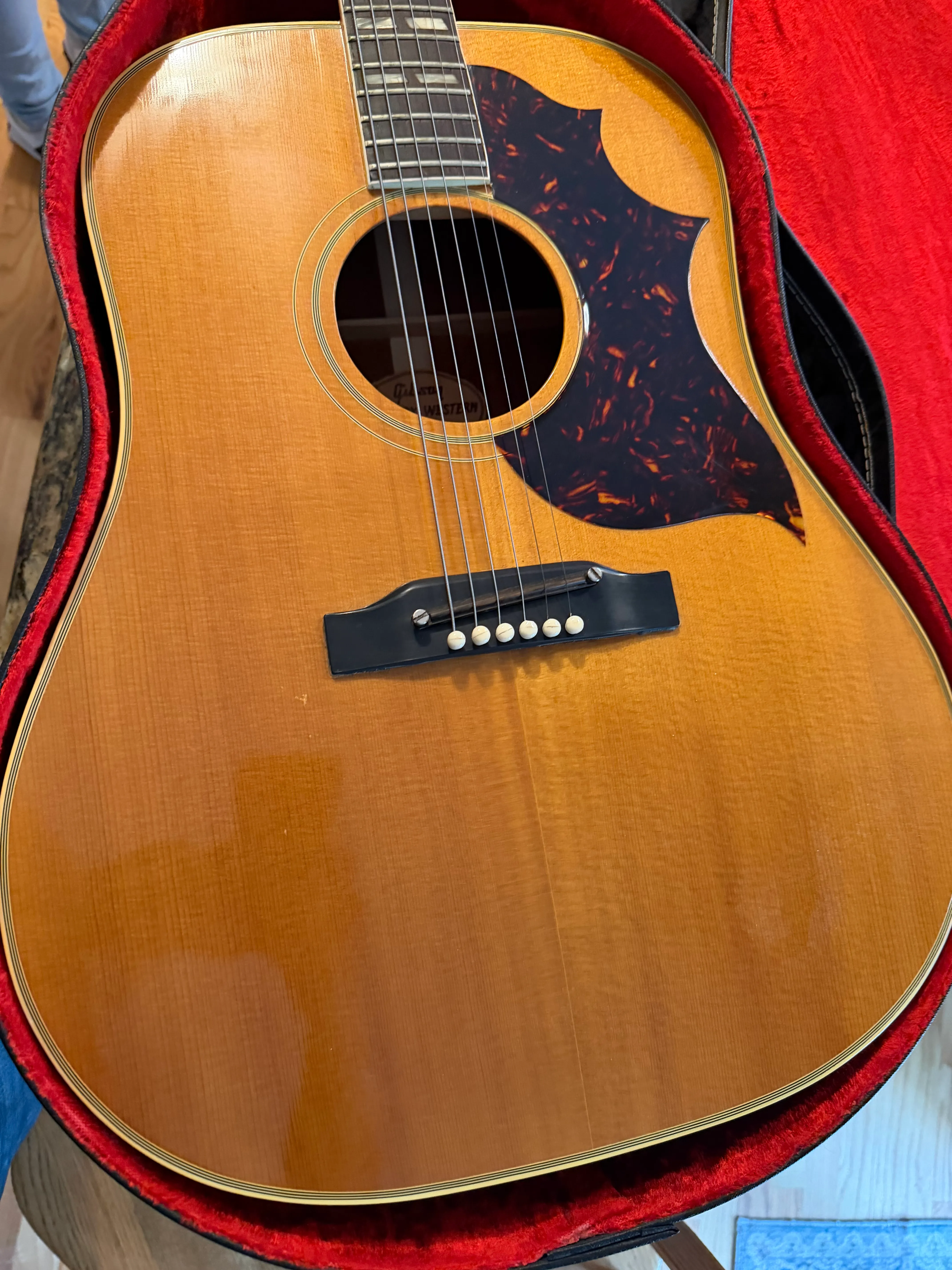 Transitional Gibson Country Western with slope shoulders, a pointed Western-style pickguard and an adjustable saddle