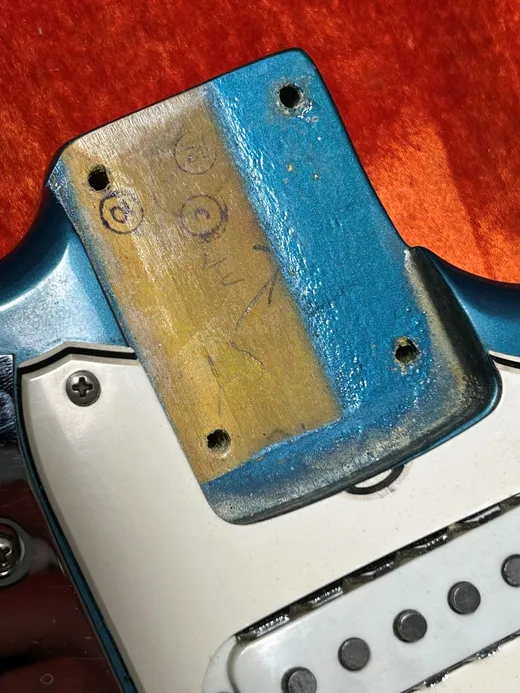 Paint stick evidence in a Fender neck pocket