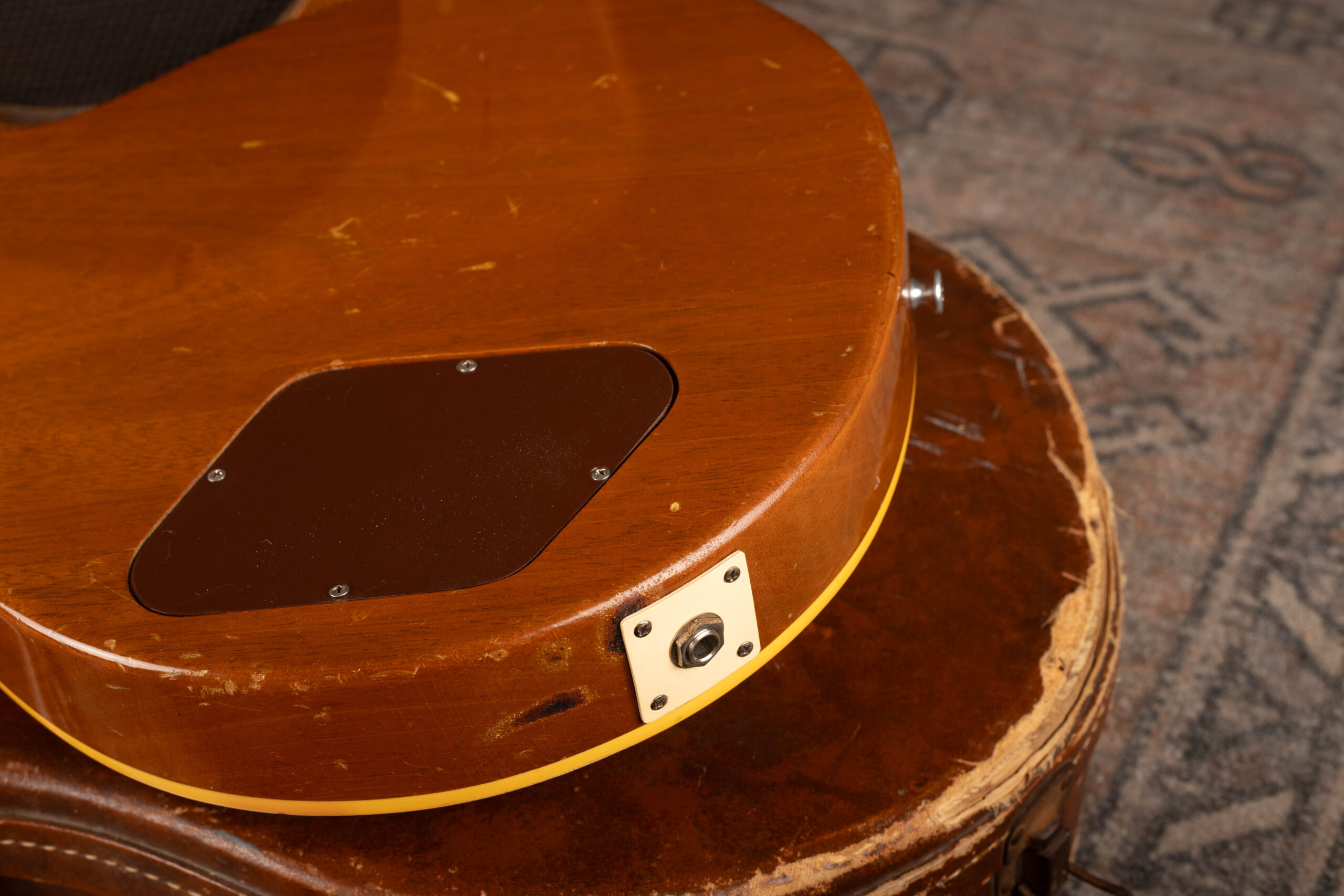 1954 Gibson Les Paul Goldtop original cream plastic output jack plate, correct mid-1950s color and material for authentication