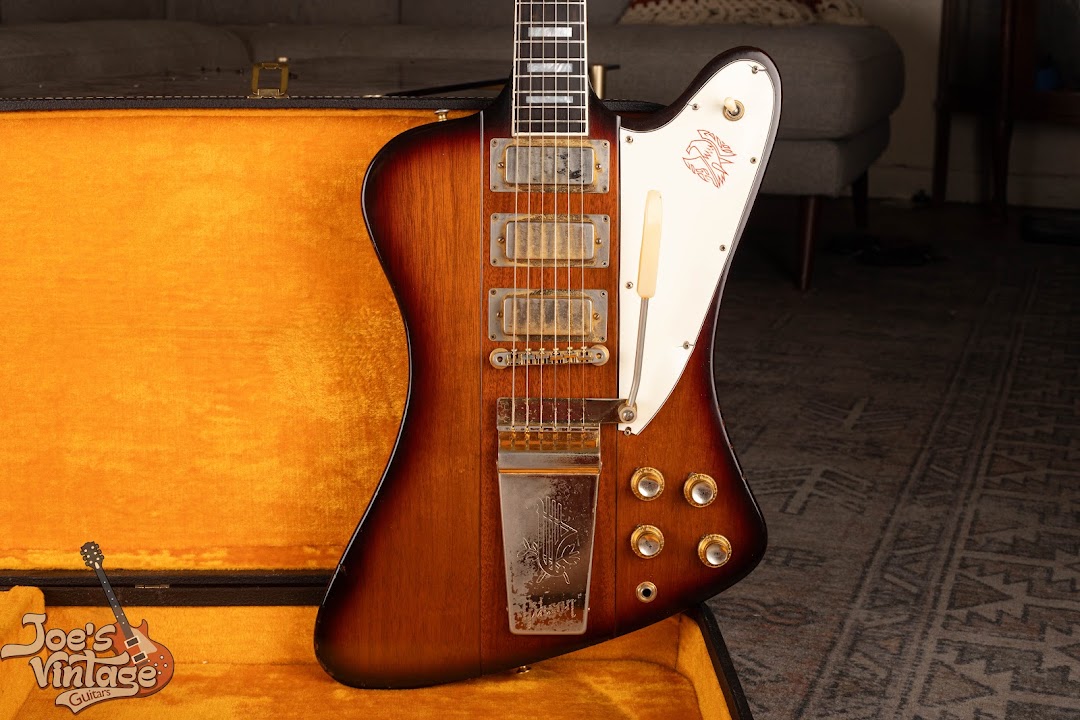 JVG archive close view of a sunburst reverse Gibson Firebird VII body, three pickups, bridge, knobs, and Lyre Vibrola