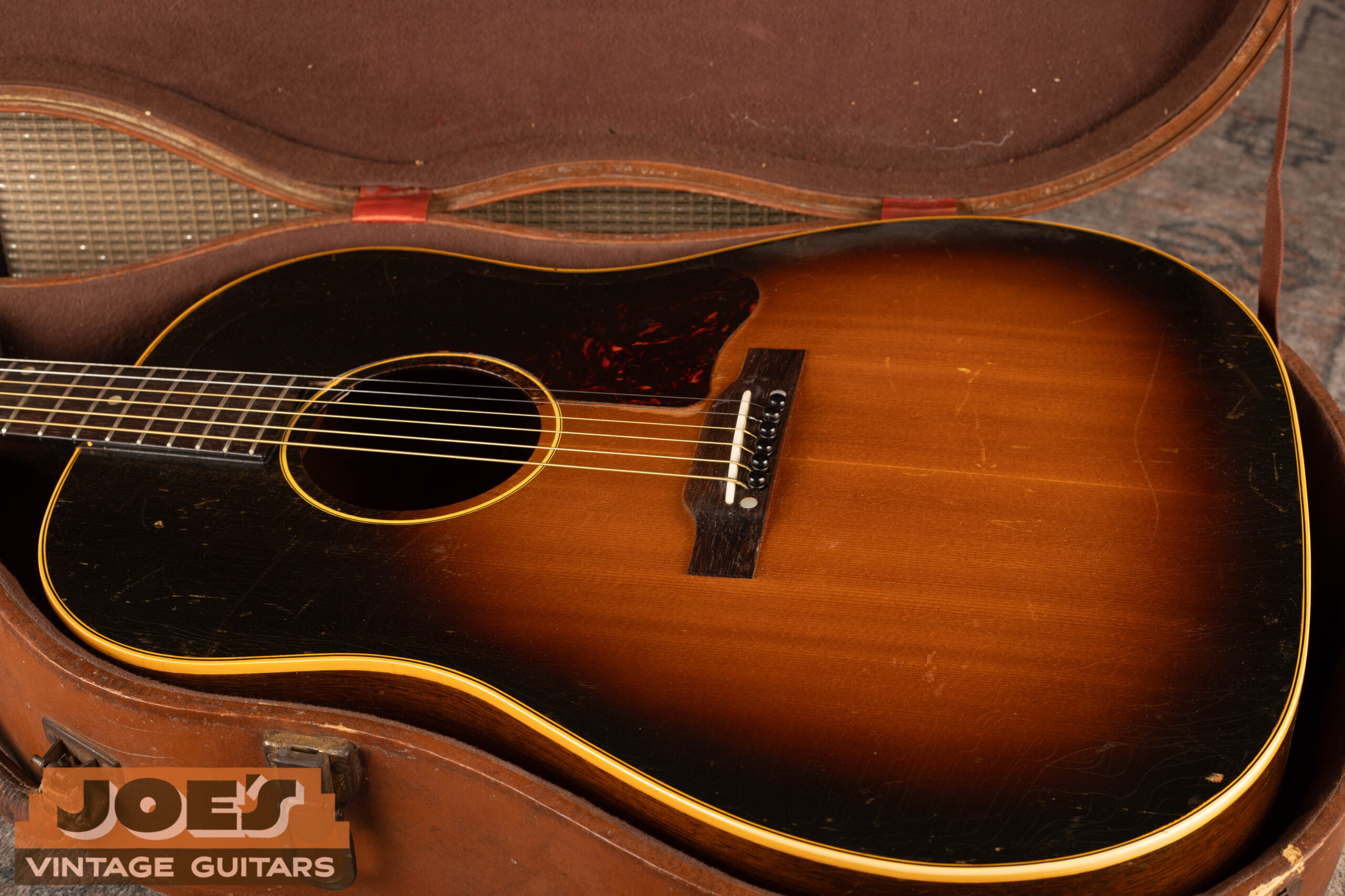 1950s Gibson J-45 acoustic guitar in original case, vintage Gibson flat-top value and collectibility