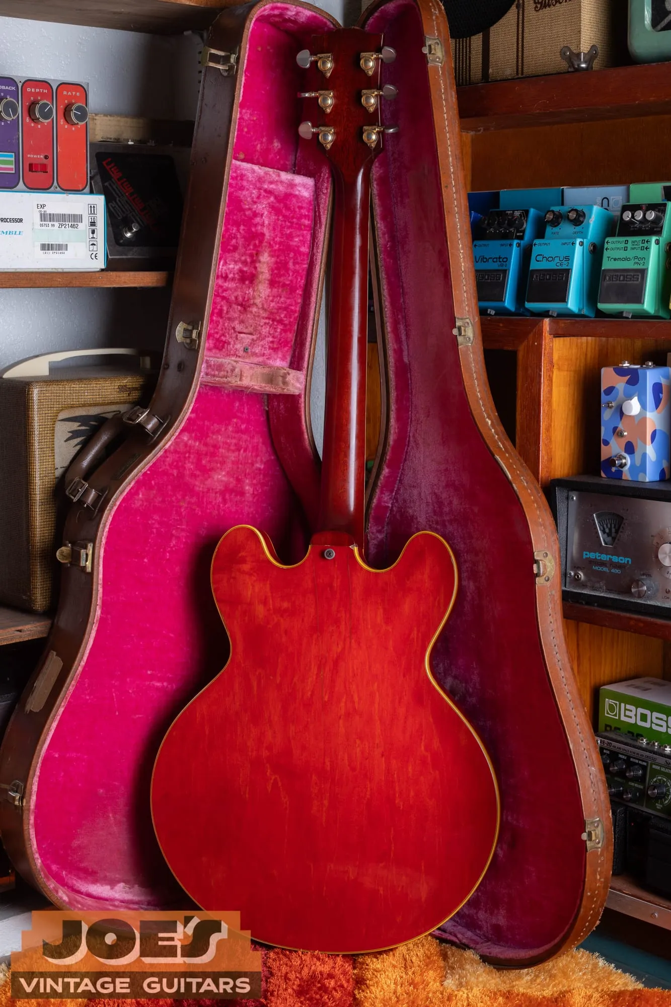 Back of a cherry 1959 Gibson ES-355 in its original case