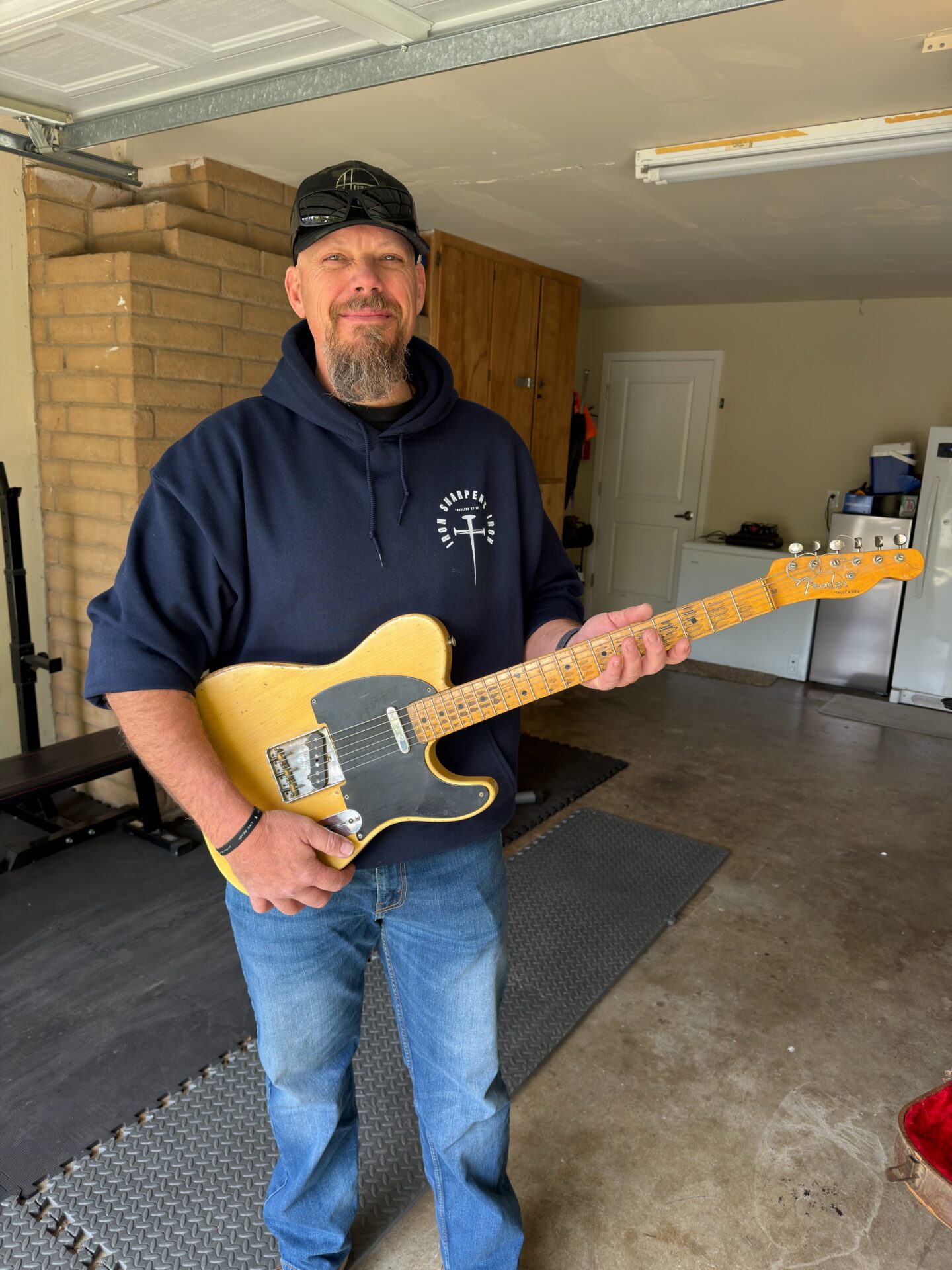 Joshua holding his uncle’s 1952 Fender Telecaster in Washington