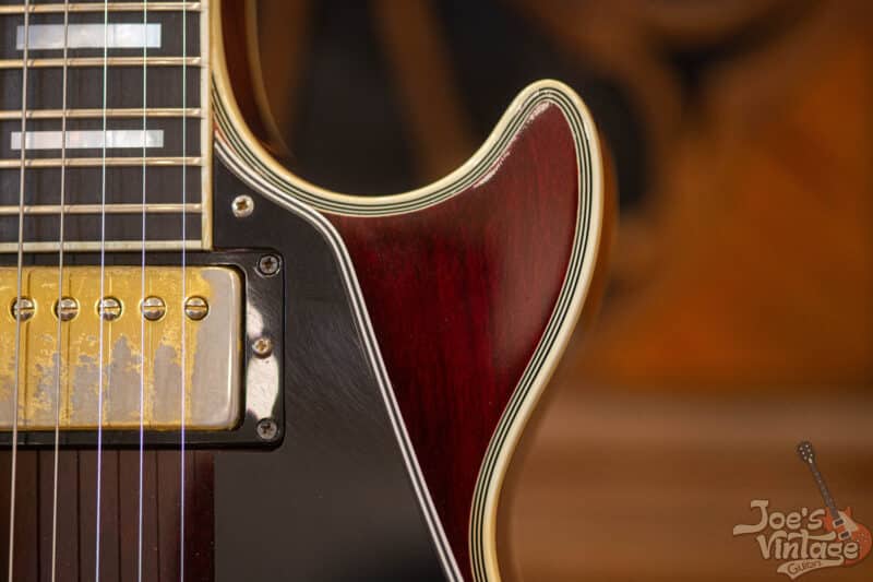 A Close up of a Gibson Les Paul guitar.