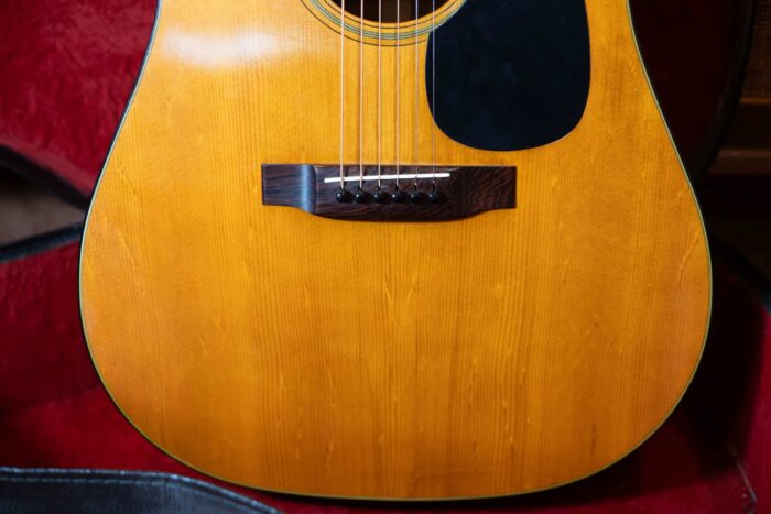 The lower front of a 1967 Martin D-18.