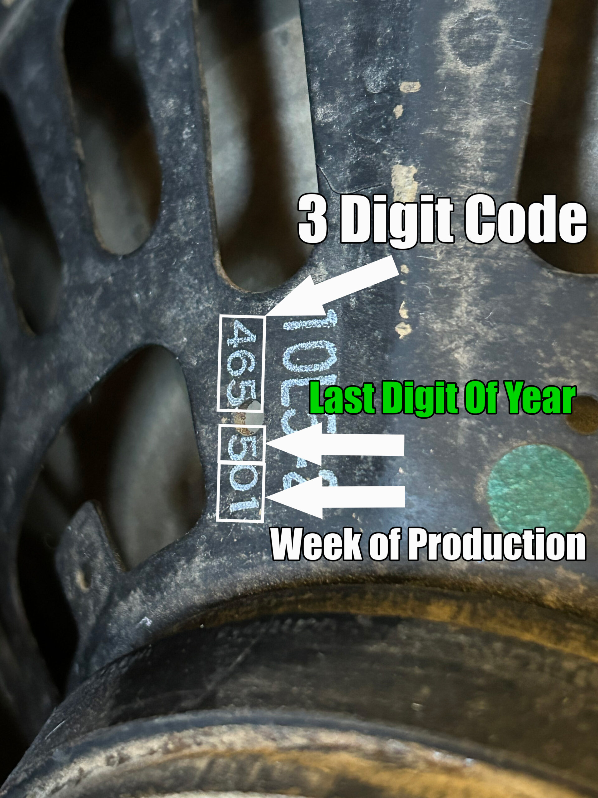 Close-up of a vintage Fender amplifier's speaker code, showing the 3-digit manufacturer code, year digit, and week of production for dating purposes