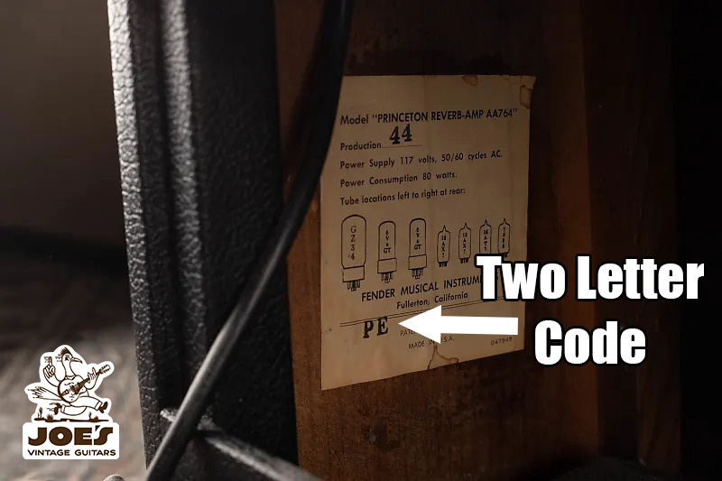 Tube chart inside a vintage Fender amplifier, showing a two-letter code used to determine the amp's production year