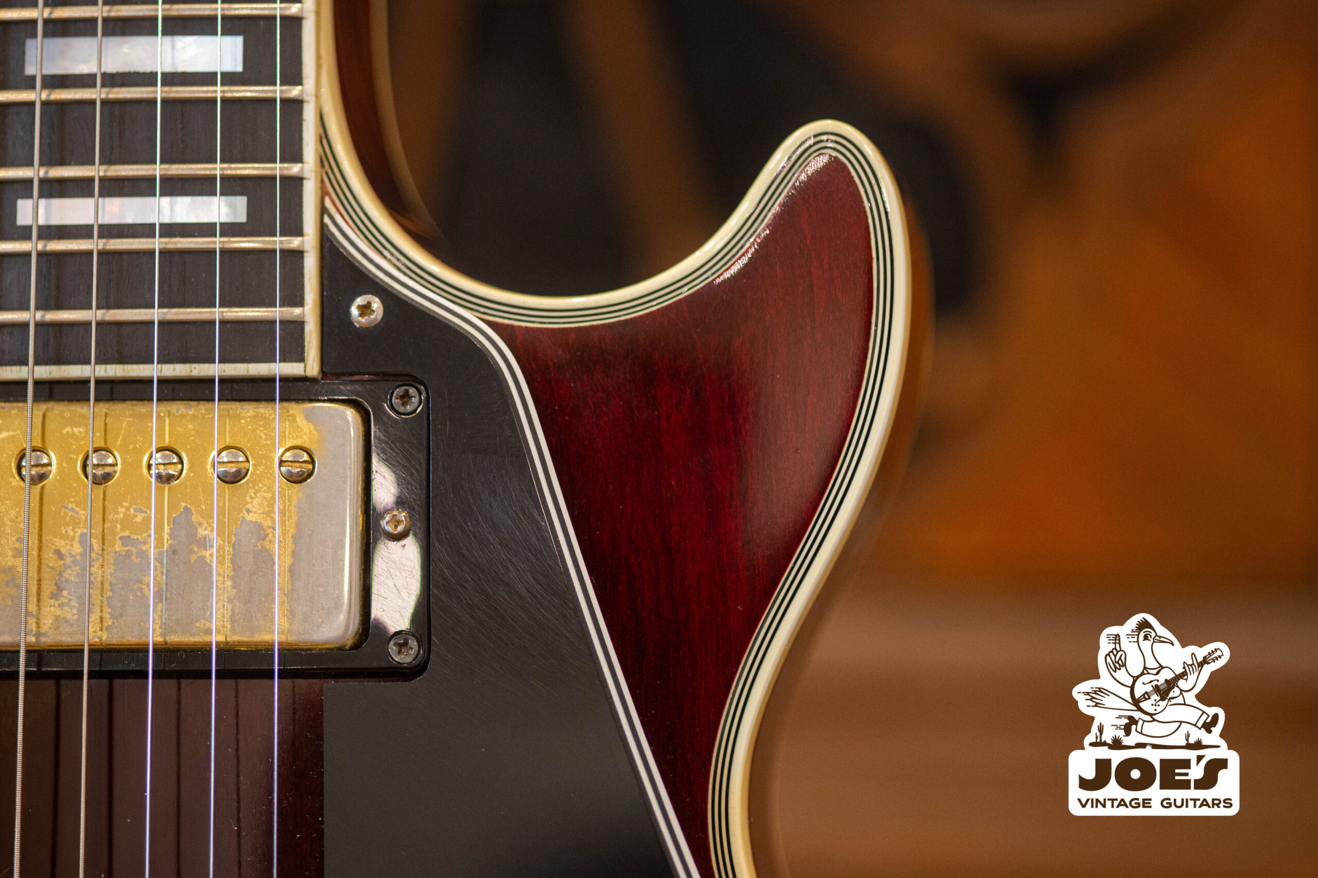 A Close up of a Gibson Les Paul guitar