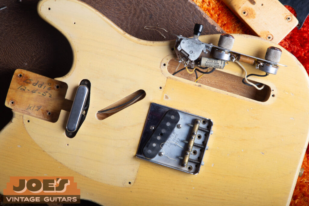 1952 Fender Telecaster body with pickguard removed showing original blonde finish ghosting.